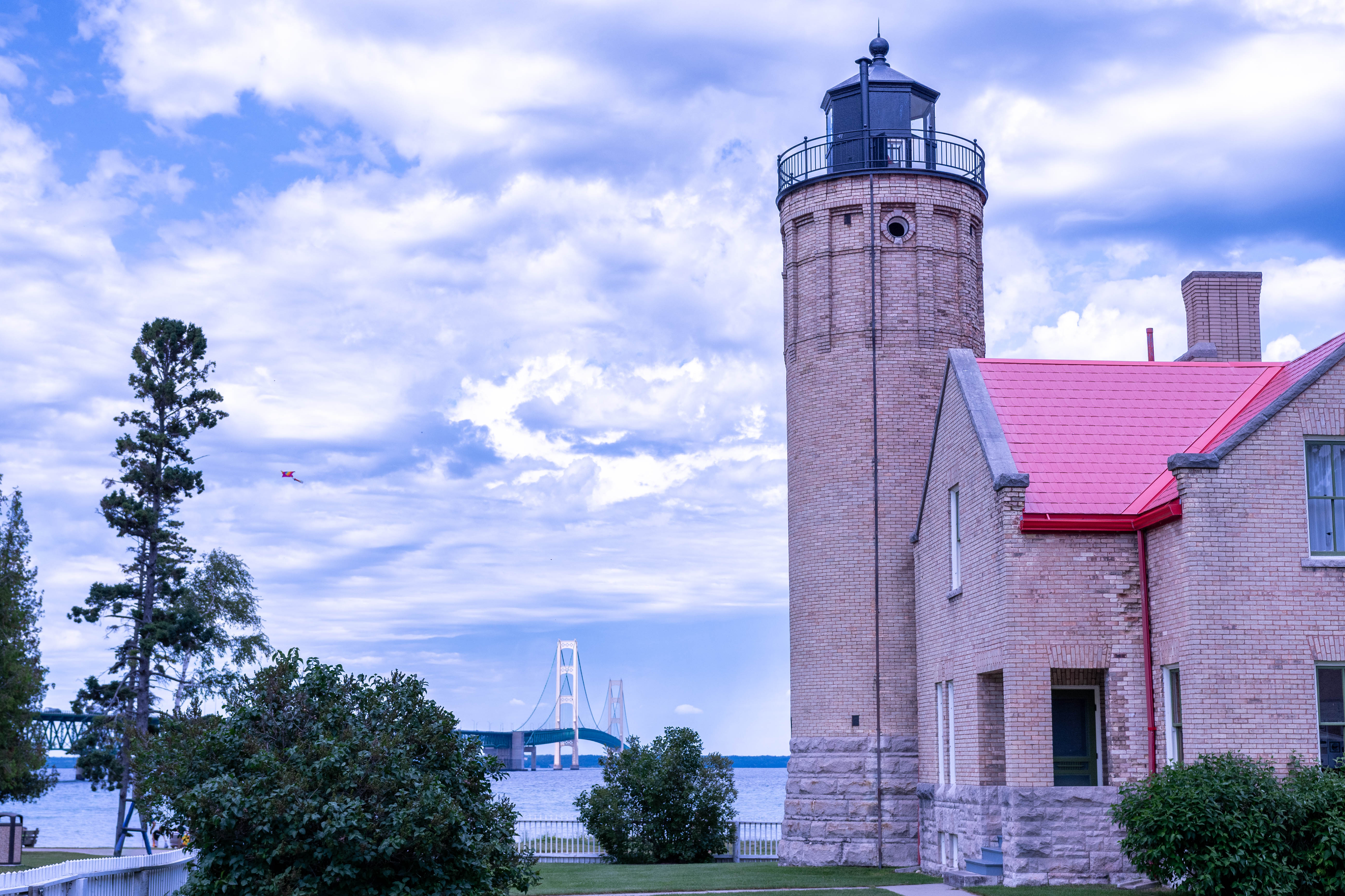 Lighthouse with the Mackinac Bridge in the distance